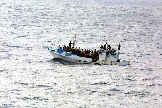 A boat with refugees capsizes off Italy